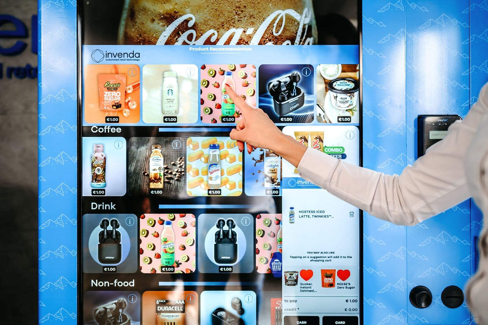 A woman selecting a product on a smart vending machine